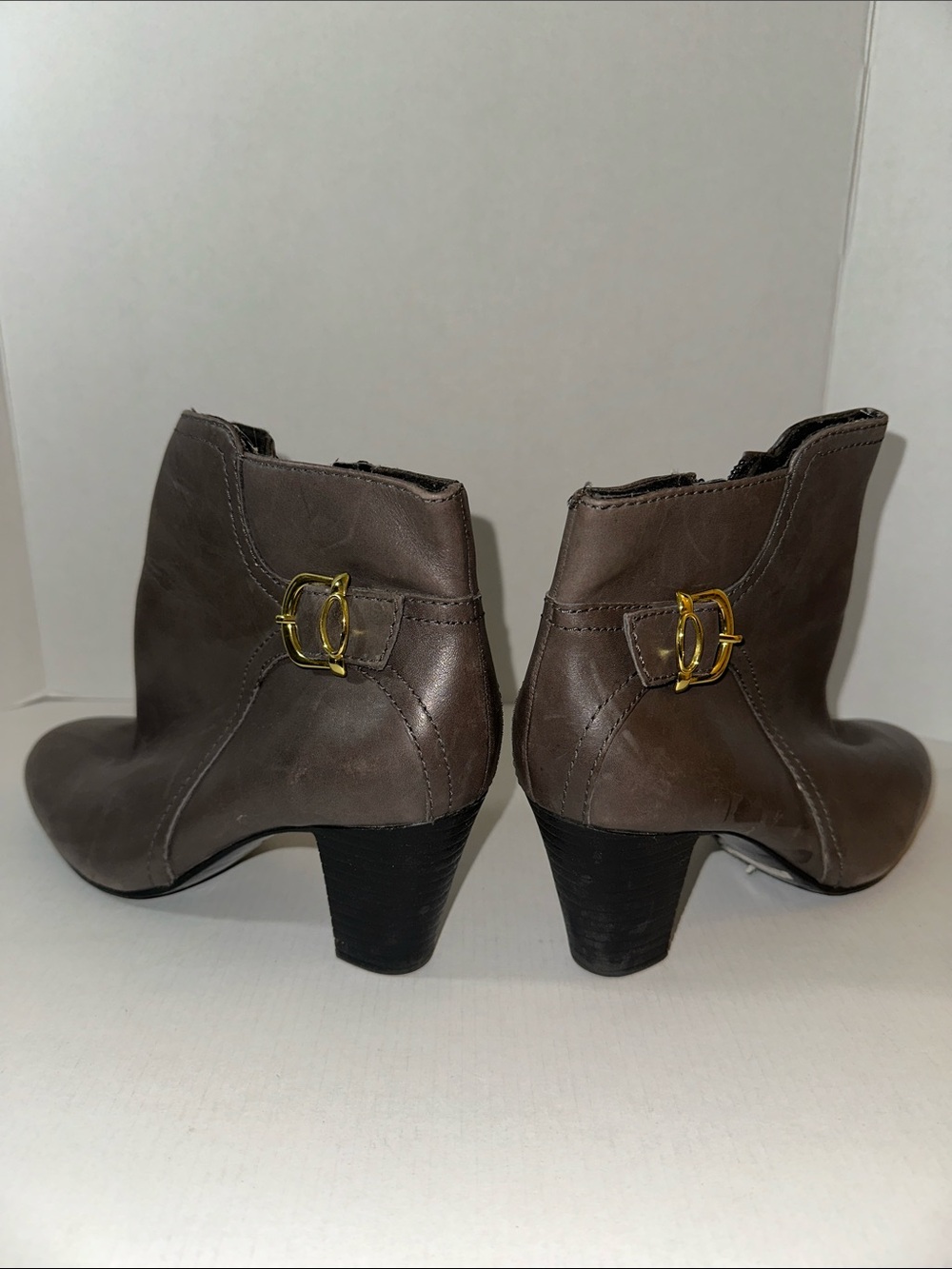 Clarks Taupe Ankle Booties with Gold Buckle Accent